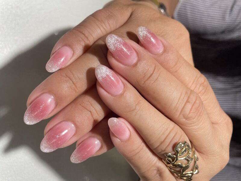 Nude coffin nails with periwinkle blue french tips