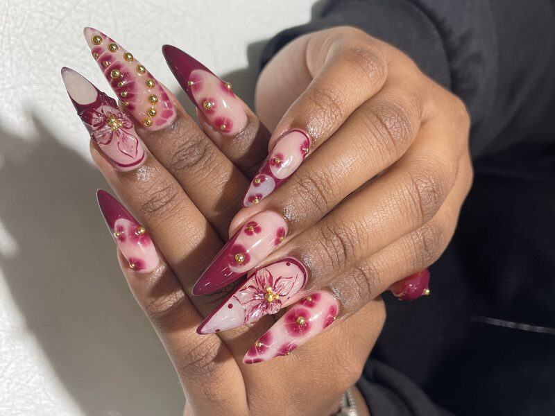 Pink chrome long square nails with silver mirror swirl accents